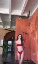 Curly-Haired Sydney May Flaunts Her Perfectly Slender Body